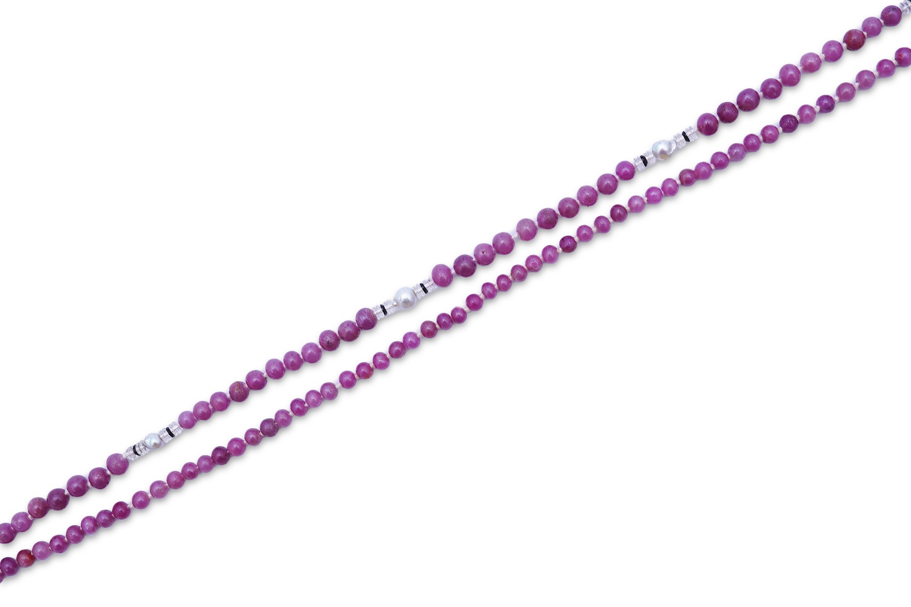 A ruby bead, onyx, rock crystal and pearl necklace